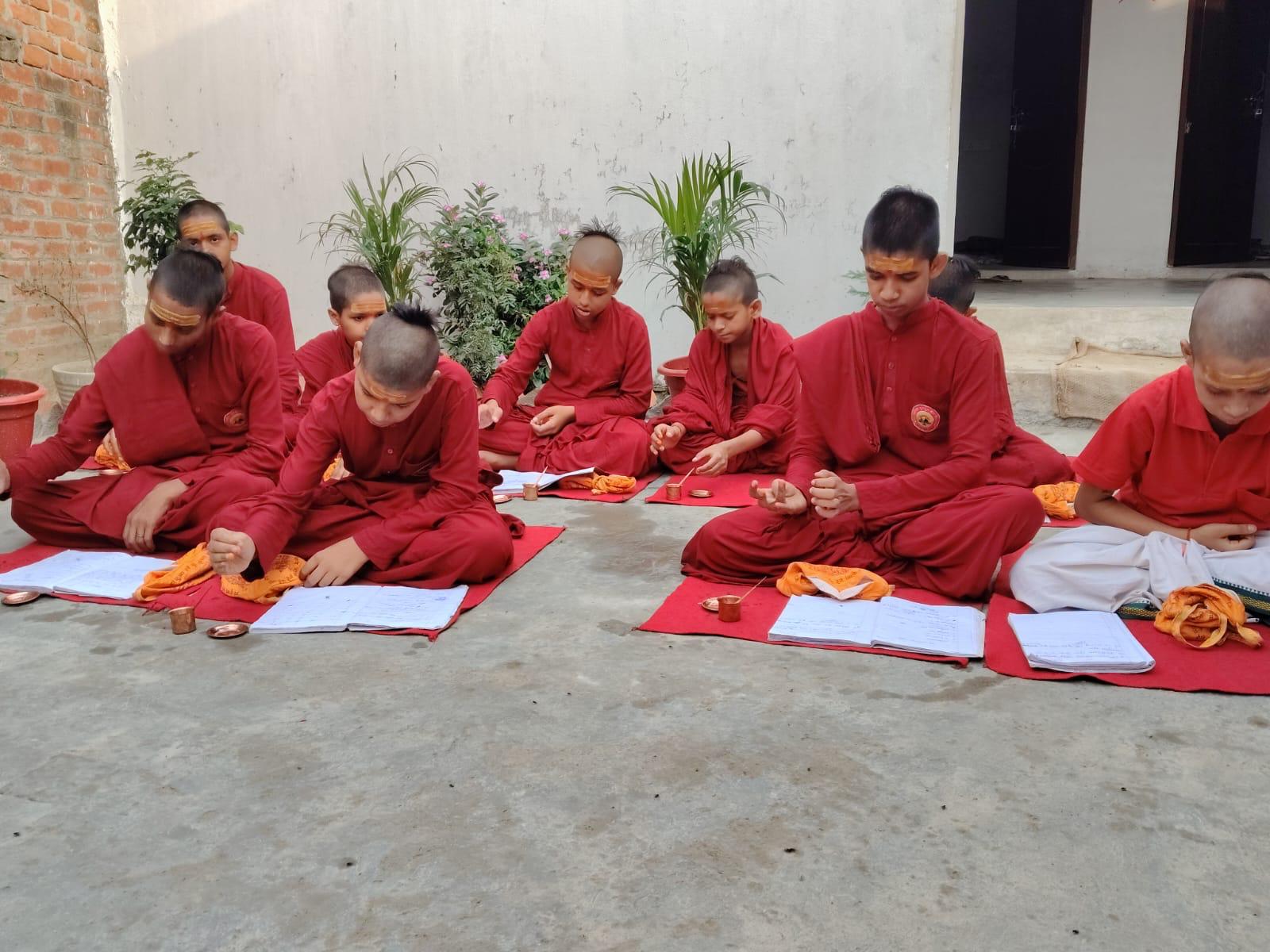 Children listening and learning at the Gurukul